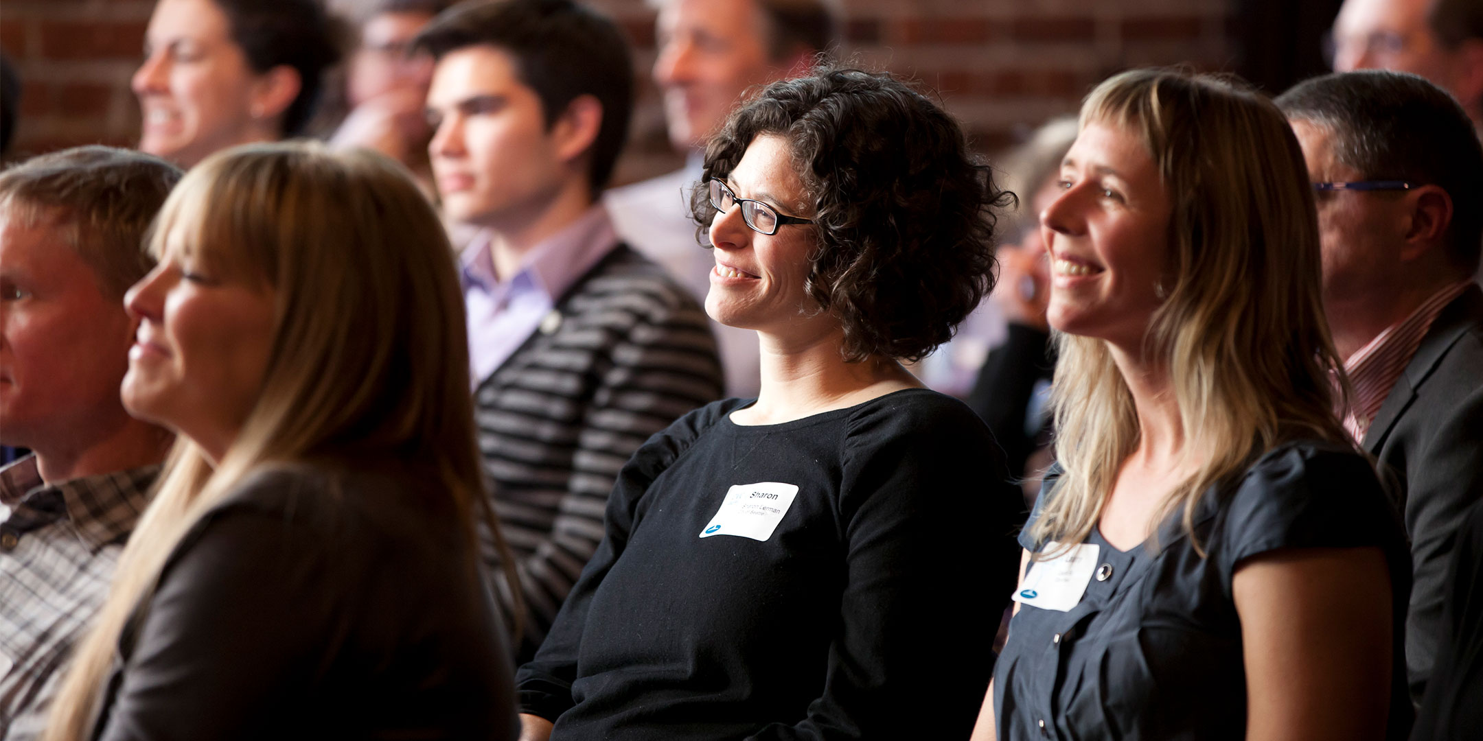 Audience smiling